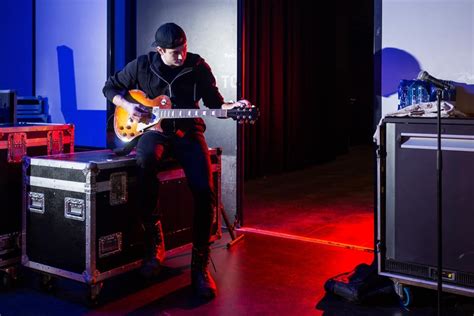 What does backline mean in music, and how does it shape the soundscape of a live performance?